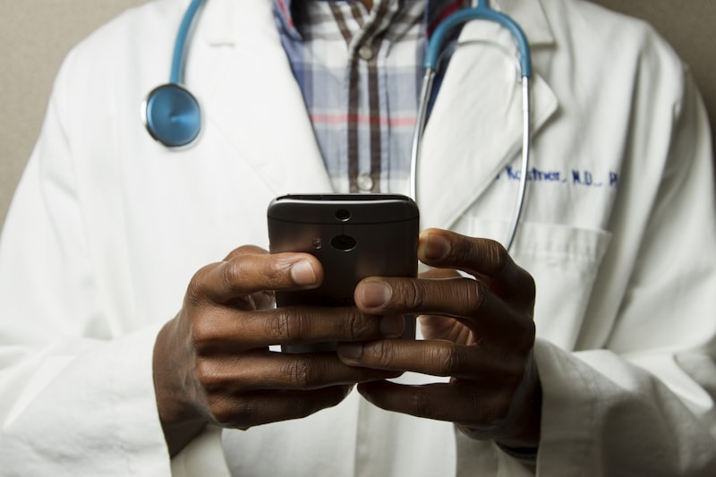 Medical professional using smartphone